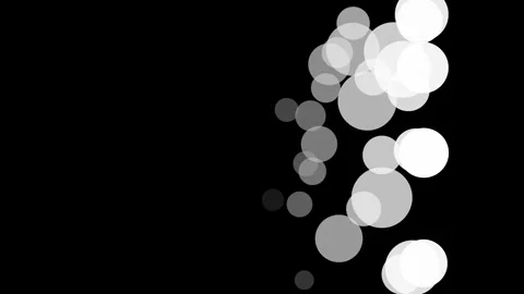 Multi greyscale round balls frenzy fun dance motion on Black screen Stock Footage 311972236