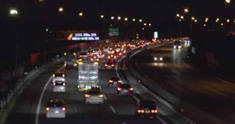 Multi-lane car traffic at night. Traffic jam. Soft focus. Stock Footage 167872884