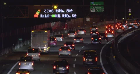 Multi-lane car traffic at night. Traffic jam. Close-up. Stock Footage 167873077