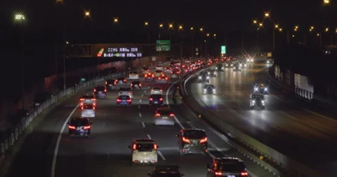 Multi-lane car traffic at night. Traffic jam. FIX. Stock Footage 167873082