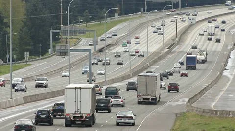 Multi-lane freeway traffic in north Washington State 1 Stock Footage