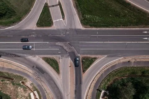 Multi-lane highway bridges over road in the countryside Stock Photos