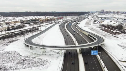 Multi-lane road. The path goes not far from the city. Forest belt aerial view Stock Footage 155466314