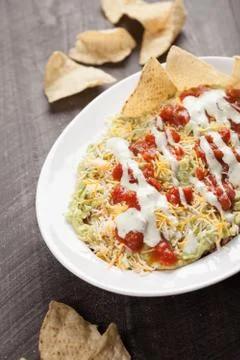 Multi-Layer Dip with Corn Tortilla Chips slightly above shot Stock Photos