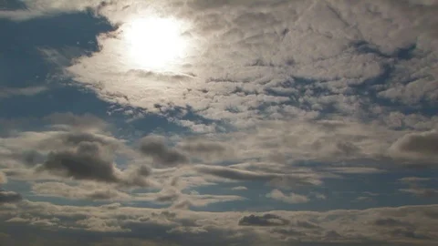 Multi-layered cloud formations with a bright moon Normandy, France Stock Footage 101208630