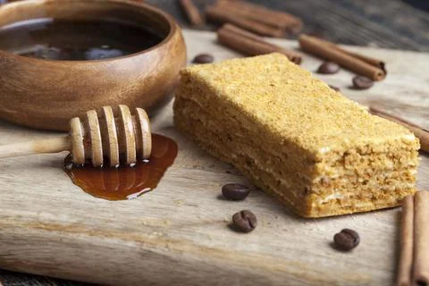 A multi-layered piece of cake made of flour and cream filling Stock Photos