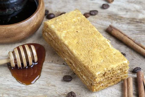 A multi-layered piece of cake made of flour and cream filling Stock Photos