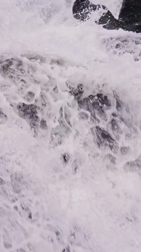 Multi-layered rock waterfall with white rapids rushing continuously Stock Footage 340485655