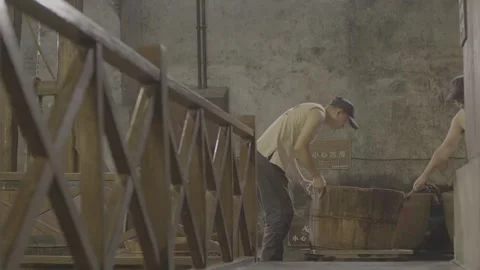 Multi lens filming of the process of handling Zhenjiang Hengshun vinegar. Video stock 253863298