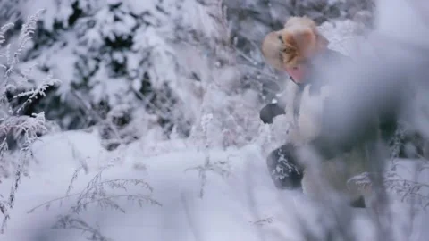 Multi lens filming of the process of two men walking in the snow. Stock Footage 256968124