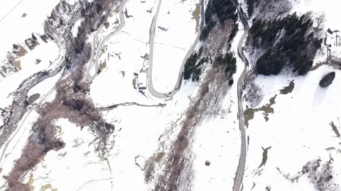 Multi level alpine road with cars and bus Видео 332134682