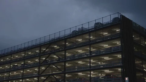 Multi Level car park with lights on against moody dark sky, Christchurch New 動画素材 127409299