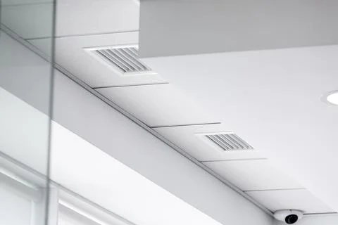 Multi-level ceiling with three-dimensional protrusions and suspended tiled. Stock Photos