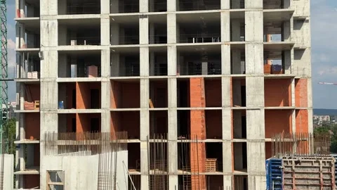 A multi-level concrete building is under construction Stock Footage 313592871