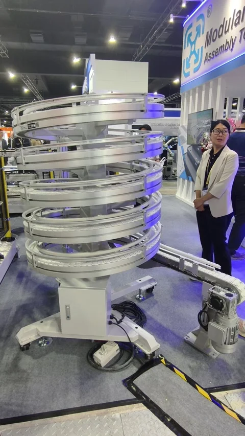 A multi-level flexible chain spiral conveyor Stock-Footage 336839115