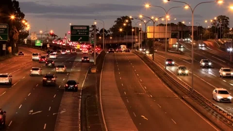 Multi-level intersection of Motorway in Sydney city at sunset – timelapse 4k. Stock Footage 205415637