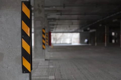 Multi-level parking with bright markings in the daytime with empty parking sp Stock Photos