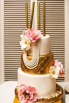 Multi level wedding cake with flowers and sparkles Stock Photos