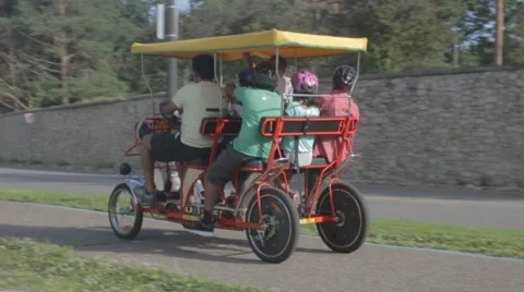 Multi-person pedal bike car takes trip Stock Video Pond5