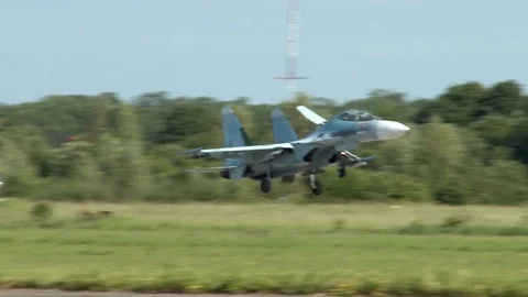 Multi-purpose aircraft Su-27 flies for landing on runway. Stock Footage 111313199