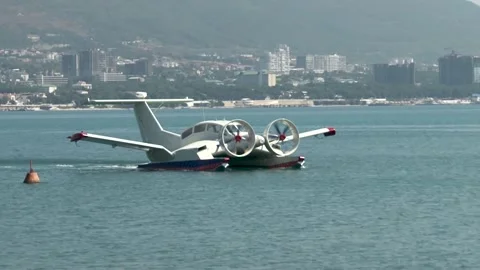 Multi-purpose ekranoplan Oriole  floats along Gelendzhik Bay, like boat. Video stock 130965074