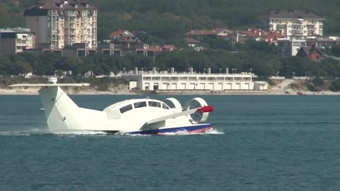 Multi-purpose ekranoplan Oriole  floats along Gelendzhik Bay, like boat. Stock Footage 132980444
