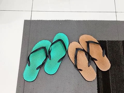 Multi-purpose thin rubber slippers popular in Southeast Asia, for leisure use Stock Photos