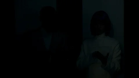 Multi-race team of future IT workers coworking in error dark data center Stock Footage 121122528