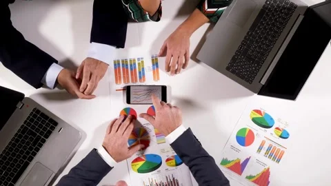 Multi racial diverse group of people working with Paperwork on a board room Stock-Footage 334654367