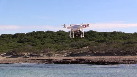 Multi-Rotor Drone Phantom 2 Flying Over sea Stock-Footage 71831215