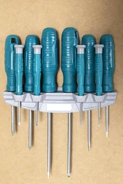 Multi-size screwdriver set mounted in hanging kit Stock Illustration