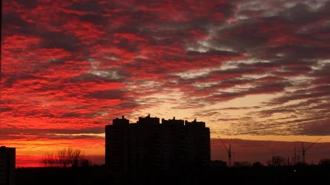 The multi-storey building against the background of a beautiful sunset Stock Footage 69766844