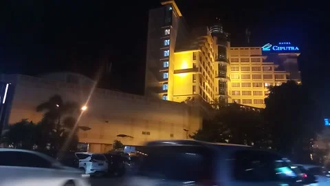 Multi storey building simpang lima central city semarang is evening Stock Footage 217178885