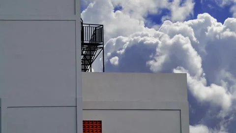 Multi-storey building with sky background Stock Footage 300981958