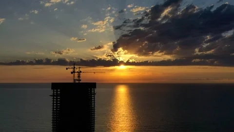 Multi-storey building under construction at sunset, 4k video Stock Footage 152375066