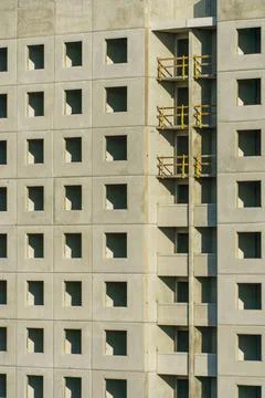 A multi-storey building under construction on a construction site. The beginn Stock Photos