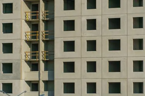 A multi-storey building under construction on a construction site. The beginn Stock Photos