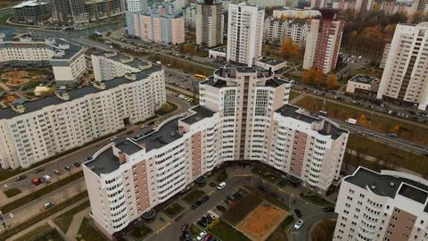 Multi-storey buildings with infrastructure. Densely populated urban area. Ove Stock Photos