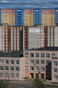Multi-storey buildings, roofs, communications.Multi-storey buildings, roofs Stock Photos