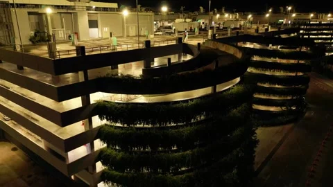 Multi-storey car park at night. Drone video Video stock 308082076