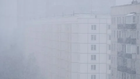 Multi-storey house in heavy snow in winter at day Stock Footage 142904887