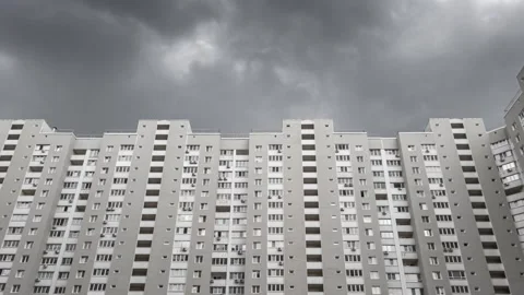 Multi Storey modern skyscraper in gloomy cloudy weather, time lapse. Stock Footage 246008547