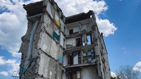 A multi-storey residential building destroyed by an air strike. A house without Stock Footage 247846343