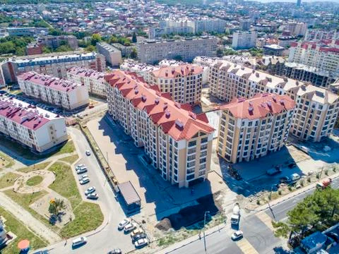 The multi-storey residential micro district consisting of several buildings.  Stock Photos