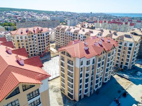 The multi-storey residential micro district consisting of several buildings.  Stock Photos