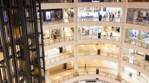 Multi-storey shopping center with elevators and balconies Malaysia timelapse Stock Footage 124270416