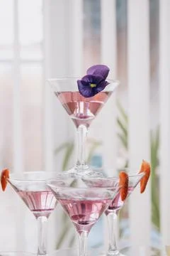 A multi-tiered installation of lime martinis Stock Photos
