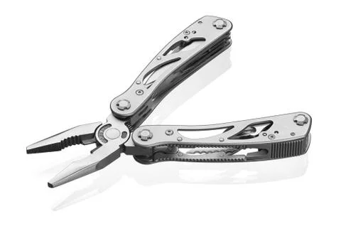 Multi tool with expanded tools and pliers isolated on a white background Stock Photos