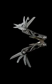 Multi-tool opened up to show tools Stock Photos