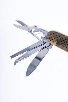 Multi-tool pocket folding with a camouflage pattern. Isolated with white back Stock Photos